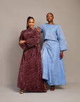 Women’s pleated two-piece set with wide sleeves and maxi skirt.